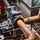 Pump sets and large-bore discharge pipework in an industrial pump house