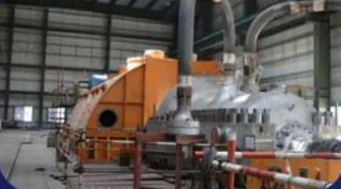 A large fan casing opened up on the workshop floor for refurbishment